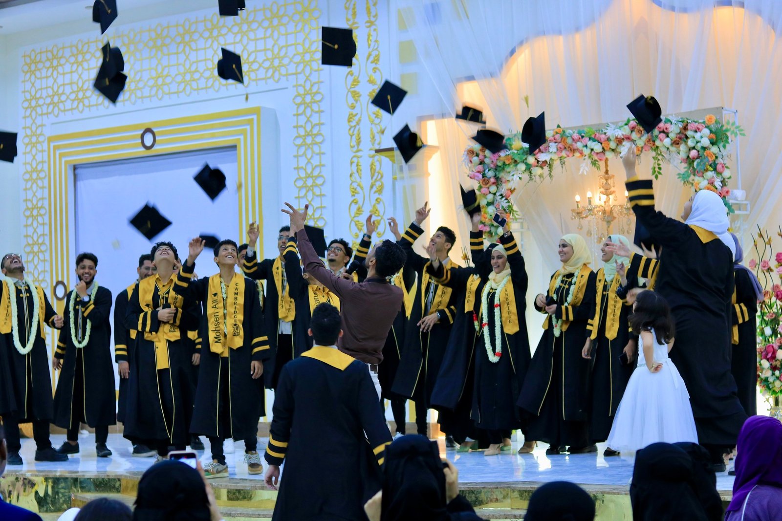 Cambridge students celebrating graduation